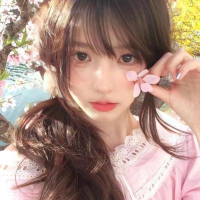 桃花含露又春风